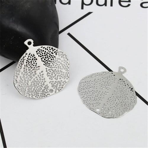 DoreenBeads Iron Based Alloy Charms Pendant Leaf Silver Color Filigree Stamping Jewelry DIY Findings 21mm x 21mm, 15 PCs