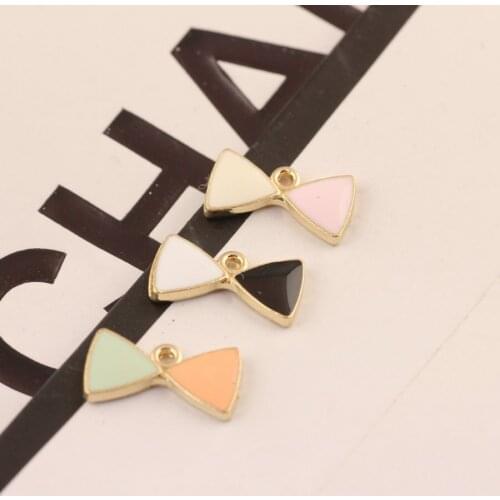 10pcs 15*8MM DIY enamel bow tie bowknot charms Korea jewelry accessories KC gold alloy small bracelet pendant candy two color