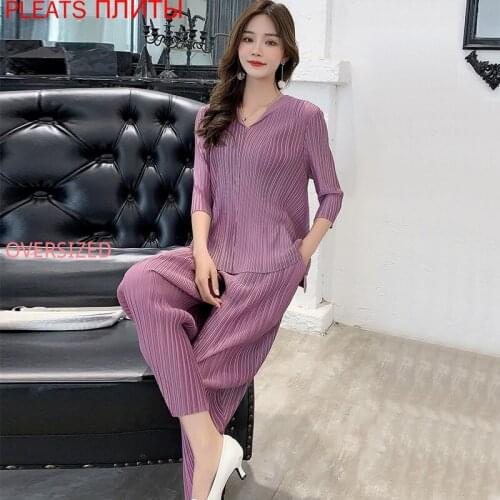 2021 Spring New Product Female Miyake Pleated Ladies Temperament Waist Pleated Hooded Top + Nine-point Pants Goddess Black Suit