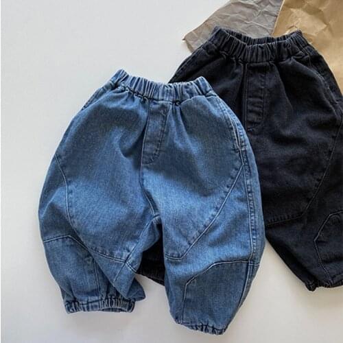 Childrens autumn new Korean trousers baby casual personality splicing loose band mouth washed jeans baby pants