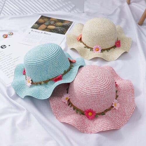 Straw knitted wide-brimmed hat summer Korean edition flower wreath children straw hat sunshade sun hat sunblock face beach hat