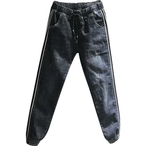 Spring autumn new elastic high waist side stripes jeans women ripped loose feet harem pants plus size 27-32