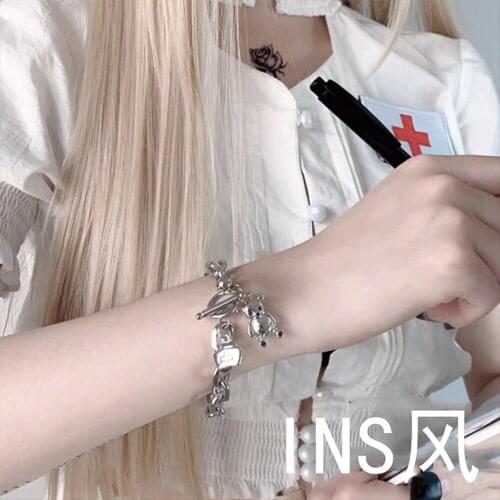 Hot selling bohimia nurse bear image bracelet one word buckle dark black simple design bracelet for student gifts