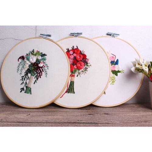 DIY embroidery material with beautiful hand holding flowers includes European flowers, fresh and elegant bouquet. Free embroider