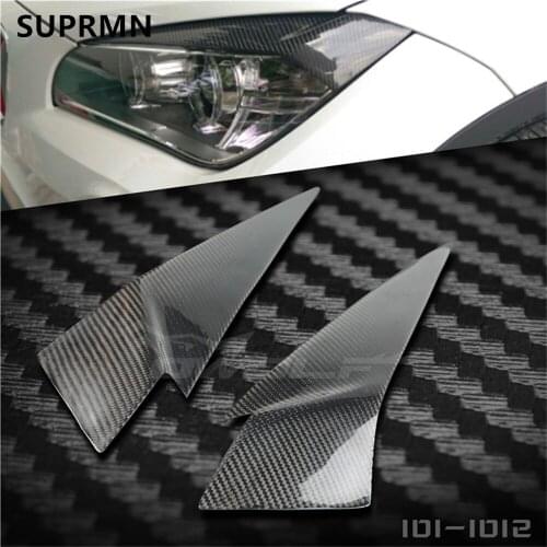 Suitable for BMW X1 E84 carbon fiber light eyebrow retrofit headlight eyebrow stickers for decoration