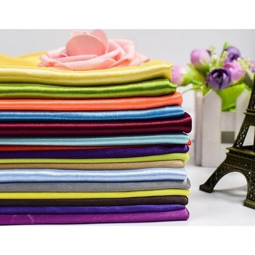 Factory price shiny stretch polyester ice silk fabric for wedding decoration