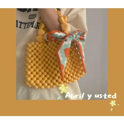 Fashion handbag womens bag mobile phone bag pearl lipstick zero Purse Beaded pure hand woven handbag summer wrist bag