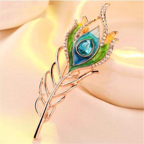 WWLB Unique Design Fashion Gold Color Peacock Feather Brooches For Women Blue Enamel Pin Crystal Brooch Jewelry Christmas Gifts