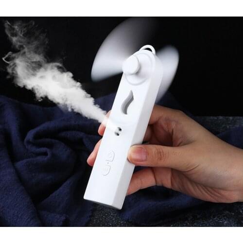 New multifunctional nano spray fan water replenishing instrument portable USB charging two in one hand humidifier spray fan