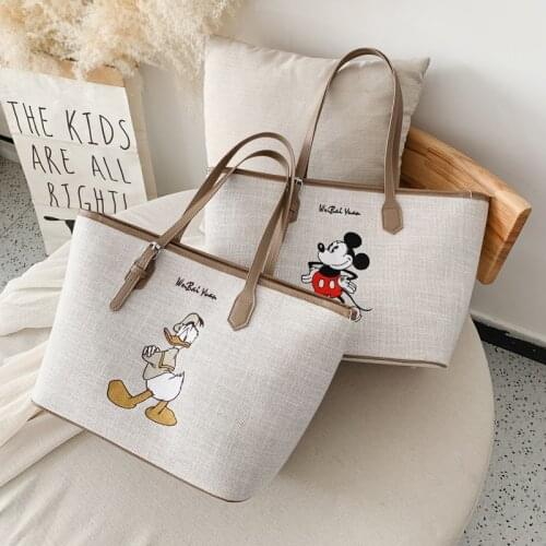 Disney Minnie High capacity handbag women Canvas bag female Tote bag cartoon bag Mickey shoulder portable shopping bag