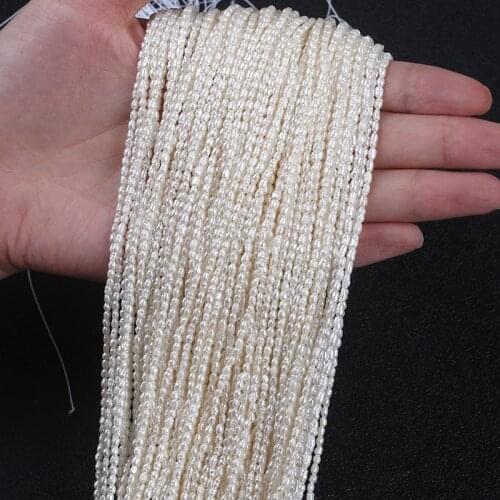 Bulk 1.5-2mm Natural White Rice Shape Freshwater Pearl