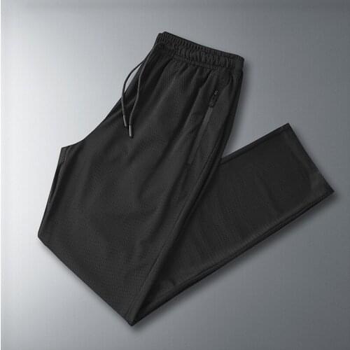Summer thin ice silk casual pants mens mesh breathable air conditioning pants quick-drying plus size