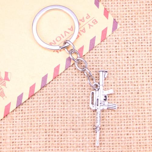 20pcs New Fashion Keychain 45x16mm machine gun assault rifle Pendants DIY Men Jewelry Car Key Chain Souvenir For Gift