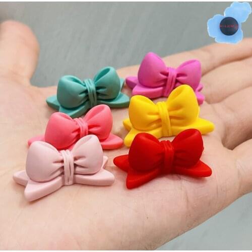 Hot Sales Wholesale 50Pcs Resin Bow-knot Kids Garden Shoe Charms Decorations Shoe Accessories Fit Croc Jibz Wristbands Backpack
