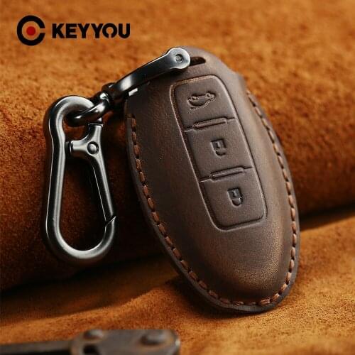 KEYYOU Genuine Leather Key Case Cover For Nissan Teana X-Trail Murano March Geniss Tiida Qashqai Livina Sylphy Sunny Juke Almera