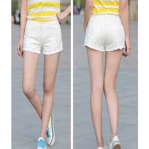 2017 Summer loose hole white denim shorts female waist Korean thin shorts