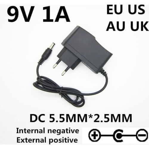 1pcs 9 v Volt 1a power supply adapter 9V 1A 1000ma universal power adapter reverse polarity Outside positive inside negative