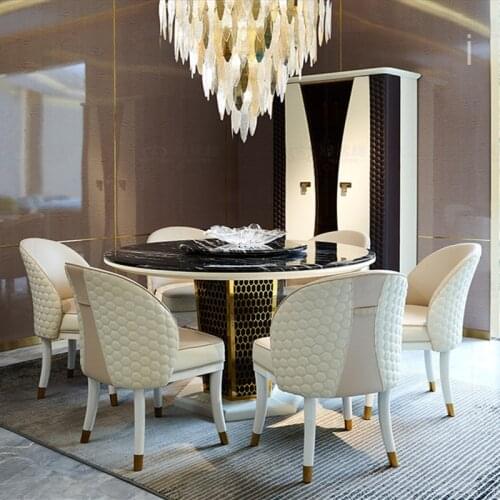 Light luxury marble dining table and chair combination post modern minimalist Italian style villa restaurant stainless steel