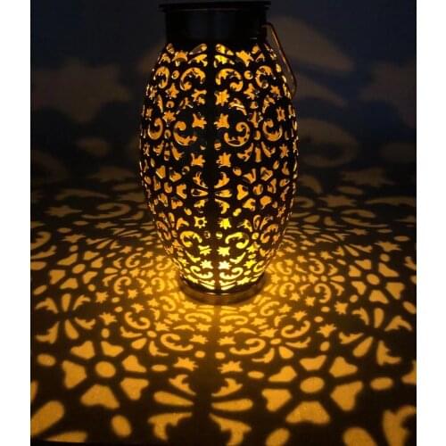 Solar iron hollow hanging lights Solar outdoor rain-proof courtyard lights lighting garden lights