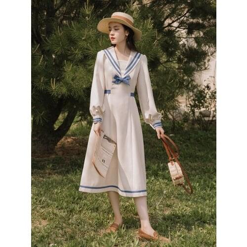 In the autumn, womens dress design is small. Navy collar waist dress can be salt, sweet and soft