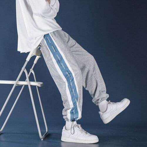 Mens 2021 New Japanese Harajuku Style Loose Casual Sports Pants Fashion Trend Classic Pocket Sports Trousers for Men and Women