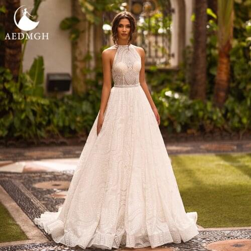 Aedmgh A-Line Beach Wedding Dresses 2021 Halter Sleeveless Bride Dress Lace Appliques Simple Court Train Boho Shiny Bridal Gowns