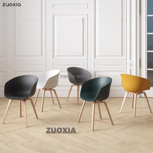 Nordic dining chair home solid wood modern minimalist armrest desk net red ins plastic negotiation backrest chair