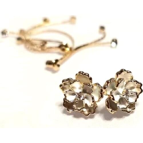 Simple And Classic Eco-plated Gold Enamel-dripped White Mesh Hollowed-out Earrings