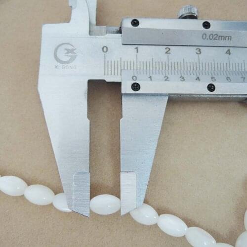 One lot 50 pcs beads ,top fashion Mabe pearl DIY beads ,5x9 MM oval shape ,rice shape-mini size diameter 5 mm