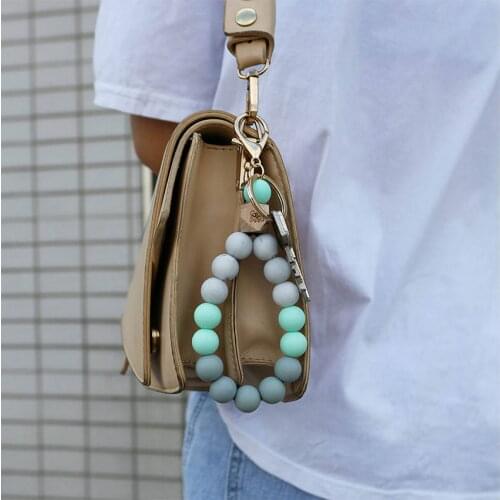 Engraved Butterfly Wood Essential Oil Diffuser Silicone Beads Wristlet Keychains for Ladies Boutique Jewelry Purse Charms