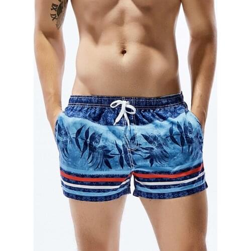Newest Mens Board Shorts Loose Swim Shorts Swimwear Leaves Printed Quick Dry Surfing Shorts Low Waist Swimsuit Beachwear