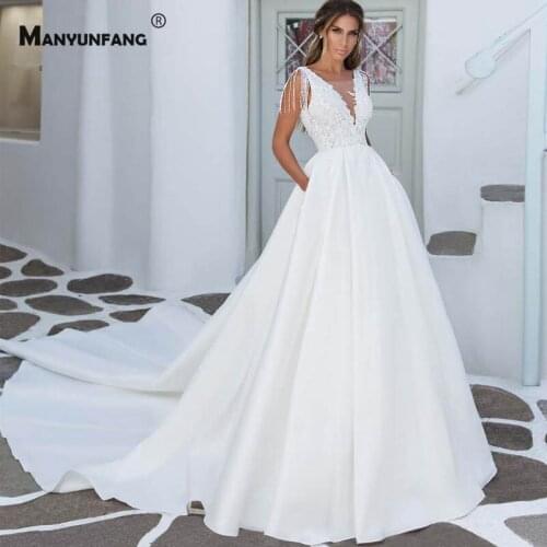Custom Made V-Neck Embroidery Appliques Satin Sleeveless Beading Bridal Ball Gown Luxury Backless Cathedral Train Wedding Dress