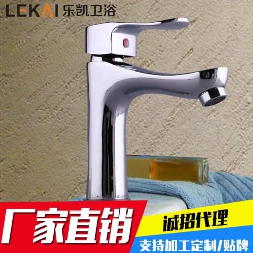 Double copper faucet wholesale bathroom basin hot and cold water faucet lift vertical washbasin faucet