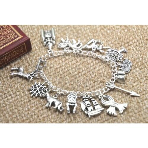 12pcs Chronicles of Narnia inspired bracelet Reindeer Snowflake Wolf Throne Ship Aslan charm bracelet