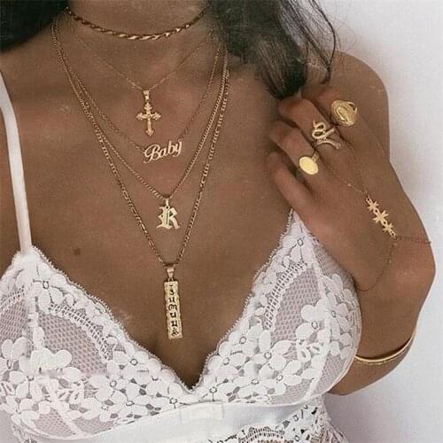 Hanzhishang fashion multi layer clavicle chain womens creative gold baby letter cross alloy necklace