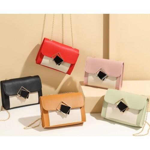 A woman 's shoulder bag 2020, a Korean diamond cubed bag , a cell phone, a purse