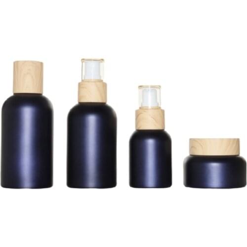 Wood Pattern Lid Empty Cosmetic Packaging Matte Frost Dark Blue Glass Spray Lotion Pump Bottles 40ML 100ML 120ML 50G Cream Jars