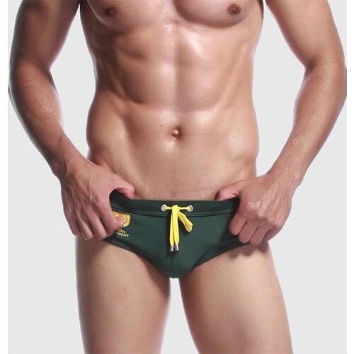 Men Swimming Trunks Occident Fashion Sexy Solid Color Swimsuit Hot Spring Beach Sports Swimsuit Summer Low waist Swimming Trunks