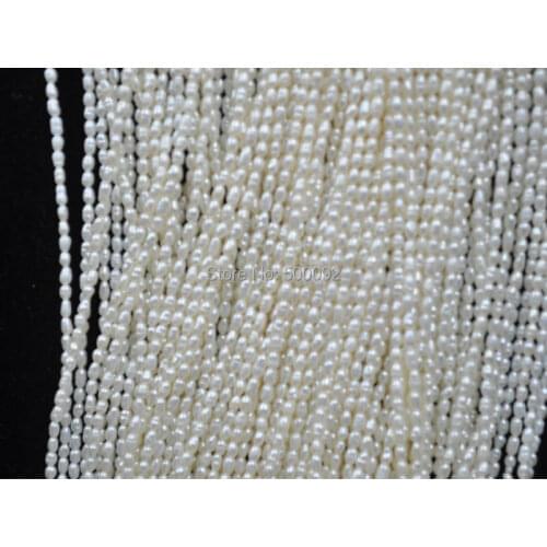 Wholesale 10 strands 2mm rice freshwater pearl lots loose strings