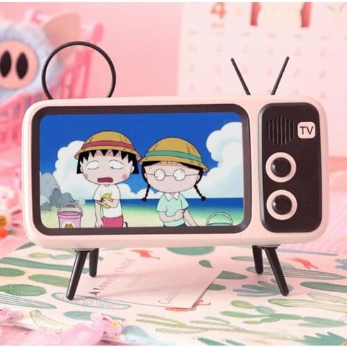 Classic TV style Phone holder & Bluetooth speaker 2 in 1 with inernal 1200mAh battery, FM radio, support reading Micro SD card