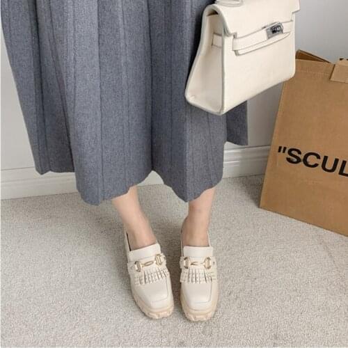 Baotou half slippers female slope with 2021 autumn new outer wear thick-soled sponge cake without heel increase lazy slippers