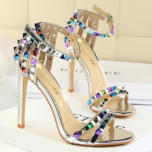 Summer new Roman style womens shoes fashion versatile thin heel super high heel open toe with hollow color rivet sandals Buckle