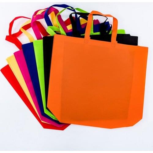 25PCS / LOT Shopping Bag Nonwoven Eco Bag Pure Color Foldable Reusable Hot Ppressing Sewing Tote Handbags