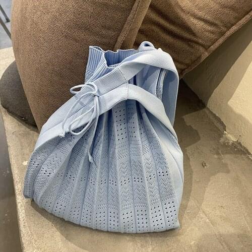 Fresh and sweet wind knitted hollow handbag shopping casual lipstick change storage bag