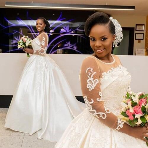 Elegant Pearls Jewel Neck Ball Gown Wedding Dresses Long Sleeve African Bridal Gowns Lace Appliques Stain Country Wedding Gowns