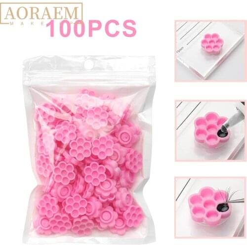 AORAEM 100pcs Eyelash Grafting Glue Holder Adhesive Gasket Pad For Eyelash Extension Blossom Plastic Pallet Lashes Makeup Tools