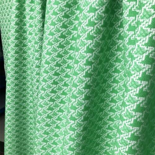 Bright green houndstooth jacquard fabric spring and autumn womens skeleton hard coat fashion clothing fabric free shipping