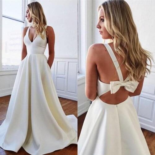 Hot New Cheap Wedding Dresses With Pockets Sexy Bow Backless A Line Satin Summer Garden Bohemian Bridal Gowns Custom Made