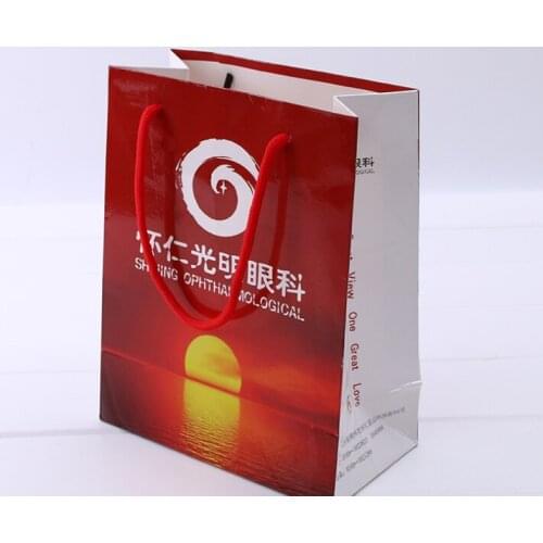China Custom logo paper gift bags with handles OEM,Printed small size advertising cute paper candy bag --XP2141
