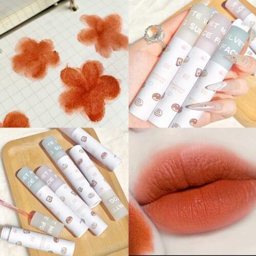 Xixi matte lip gloss cartoon white design Rose red orange pigment long lasting waterproof silky nude lip tint AC401